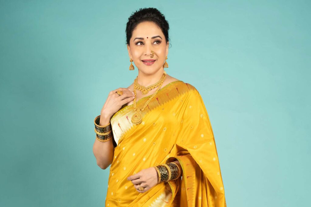 Madhuri Dixit in Yellow Banarasi Paithani Saree