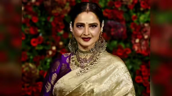 Rekha in real zari banarsi saree with gold zari